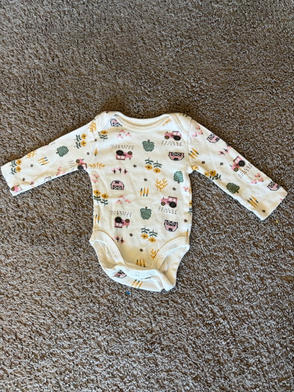Long-Sleeve Cream Baby Bodysuit with Pink Tractor & Green Floral Print